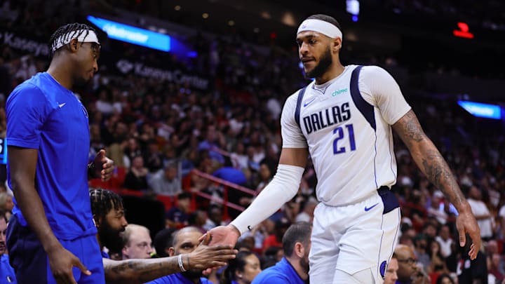 Apr 10, 2024; Miami, Florida, USA; Dallas Mavericks center Daniel Gafford (21) returns to the bench against the Miami Heat during the third quarter at Kaseya Center. Mandatory Credit: Sam Navarro-Imagn Images