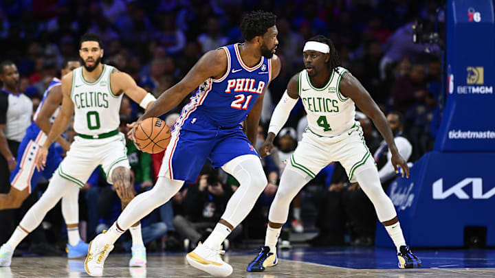 Nov 8, 2023; Philadelphia, Pennsylvania, USA; Philadelphia 76ers center Joel Embiid (21) controls the ball against Boston Celtics guard Jrue Holiday (4) in the first quarter at Wells Fargo Center. Mandatory Credit: Kyle Ross-Imagn Images