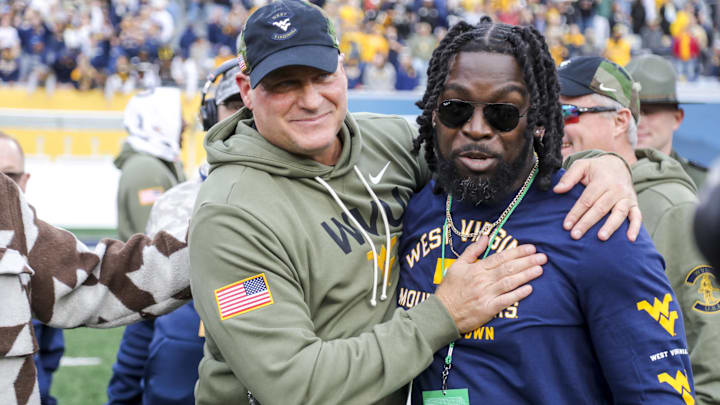 Nov 8, 2025; Morgantown, West Virginia, USA; West Virginia Mountaineers head coach Rich Rodriguez celebrates after defeating the Colorado Buffaloes at Milan Puskar Stadium. Mandatory Credit: Ben Queen-Imagn Images