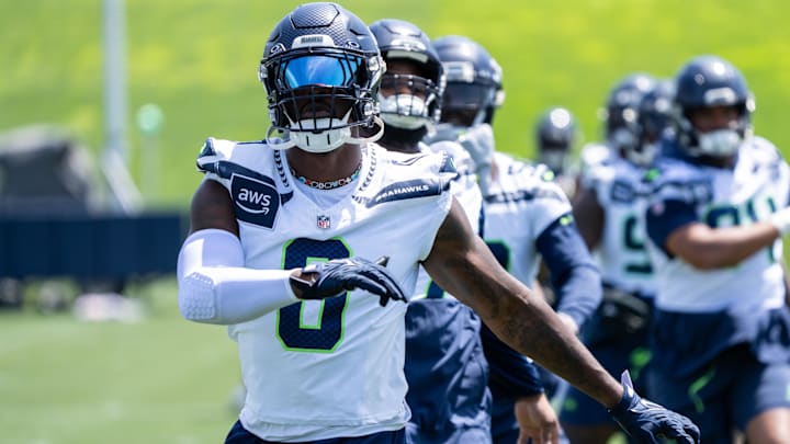 Seattle Seahawks defensive end DeMarcus Lawrence takes part in drills during mini-camp at Virginia Mason Athletic Center. 