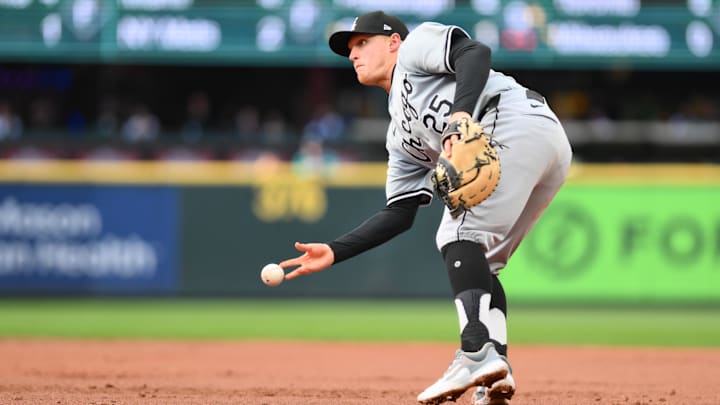 Jun 11, 2024; Seattle, Washington, USA; Chicago White Sox first baseman Andrew Vaughn (25) throws the ball to first base for a force out against the Seattle Mariners during the second inning at T-Mobile Park.