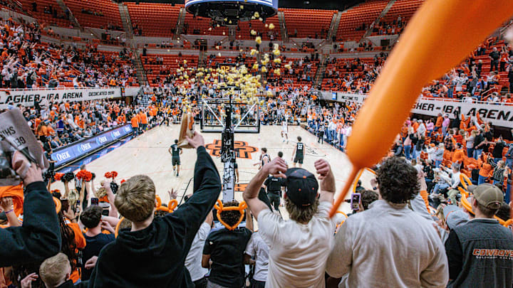 Feb 25, 2025; Stillwater, Oklahoma, USA; Oklahoma State Cowboys fans react at the end of the game against the Iowa State Cyclones at Gallagher-Iba Arena. Mandatory Credit: William Purnell-Imagn Images