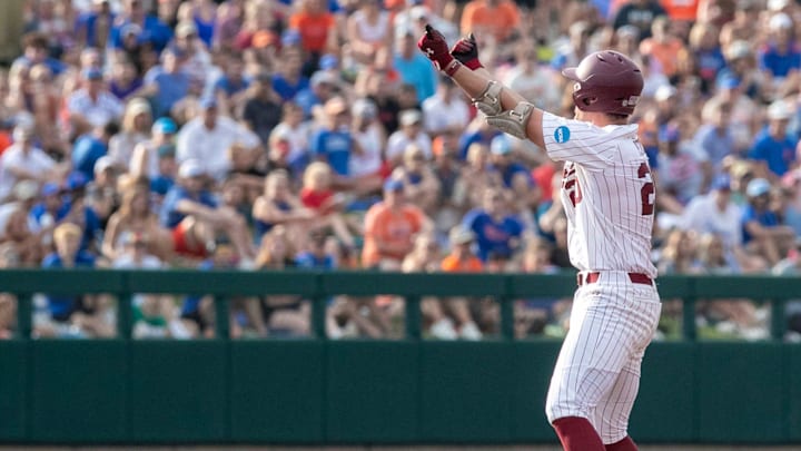 Gamecocks utility Ethan Petry (20) with a double in Game 2 of the NCAA Super Regional against