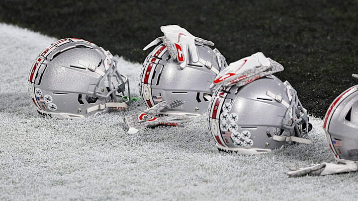 Jan. 11, 2021; Miami Gardens, Florida, USA; Ohio State Buckeye helmets along the end zone during warm-ups before the College Football Playoff National Championship between the Alabama Crimson Tide and the Ohio State Buckeyes at Hard Rock Stadium in Miami Gardens, Fla. on January 11, 2021. Jan. 11, 2021; Miami Gardens, Florida, USA; Ohio State Buckeye helmets along the end zone during warm-ups before the College Football Playoff National Championship between the Alabama Crimson Tide and the Ohio State Buckeyes at Hard Rock Stadium in Miami Gardens, Fla. on January 11, 2021.
