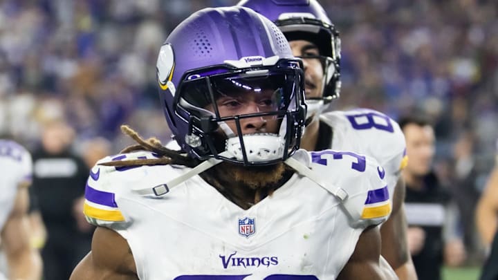 Jan 13, 2025; Glendale, AZ, USA; Minnesota Vikings running back Aaron Jones Sr. (33) against the Los Angeles Rams during an NFC wild card game at State Farm Stadium. Mandatory Credit: Mark J. Rebilas-Imagn Images Jan 13, 2025; Glendale, AZ, USA; Minnesota Vikings running back Aaron Jones Sr. (33) against the Los Angeles Rams during an NFC wild card game at State Farm Stadium. Mandatory Credit: Mark J. Rebilas-Imagn Images