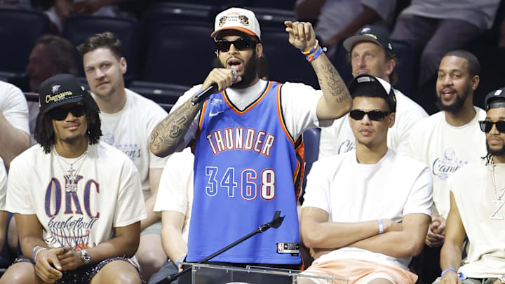 Jun 24, 2025; Oklahoma City, OK, USA; Oklahoma City Thunder forward Kenrich Williams (34) speaks to fans during the Champions Opening Ceremony for the parade inside the Paycom Center. Mandatory Credit: Alonzo Adams-Imagn Images Jun 24, 2025; Oklahoma City, OK, USA; Oklahoma City Thunder forward Kenrich Williams (34) speaks to fans during the Champions Opening Ceremony for the parade inside the Paycom Center. Mandatory Credit: Alonzo Adams-Imagn Images