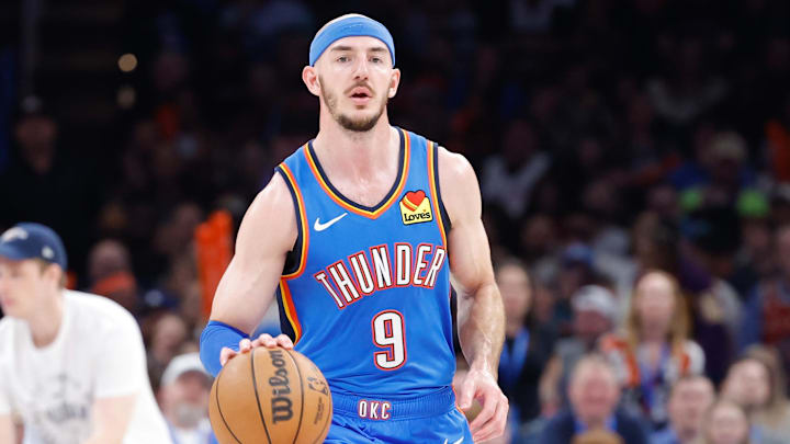 Apr 8, 2025; Oklahoma City, Oklahoma, USA; Oklahoma City Thunder guard Alex Caruso (9) dribbles down the court against the Los Angeles Lakers during the second half at Paycom Center. Apr 8, 2025; Oklahoma City, Oklahoma, USA; Oklahoma City Thunder guard Alex Caruso (9) dribbles down the court against the Los Angeles Lakers during the second half at Paycom Center.