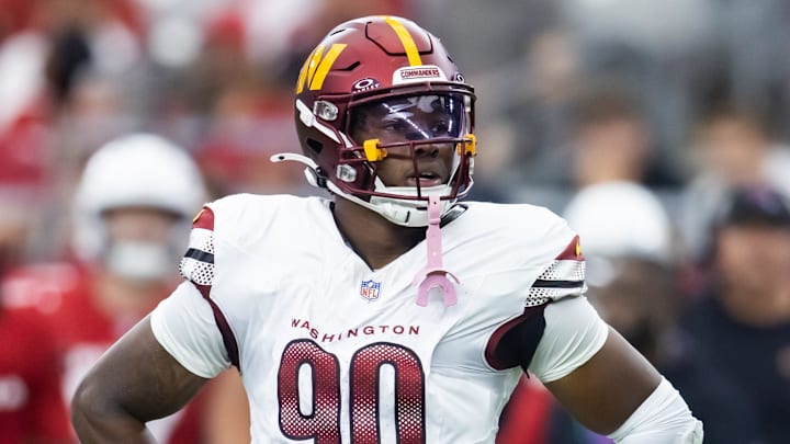Sep 29, 2024; Glendale, Arizona, USA; Washington Commanders defensive end Javontae Jean-Baptiste (90) against the Arizona Cardinals at State Farm Stadium. Mandatory Credit: Mark J. Rebilas-Imagn Images