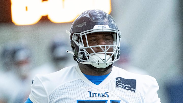Defensive lineman Keondre Coburn (91) runs through drills during the Tennessee Titans mandatory mini-camp at Ascension Saint Thomas Sports Park in Nashville, Tenn., Tuesday, June 4, 2024.