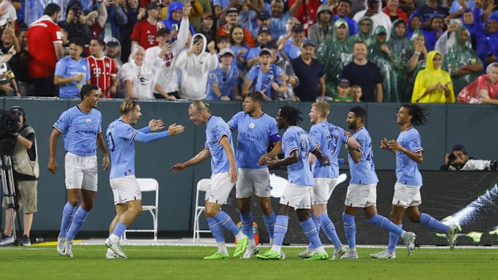 Manchester City FC celebrates after scoring a goal
