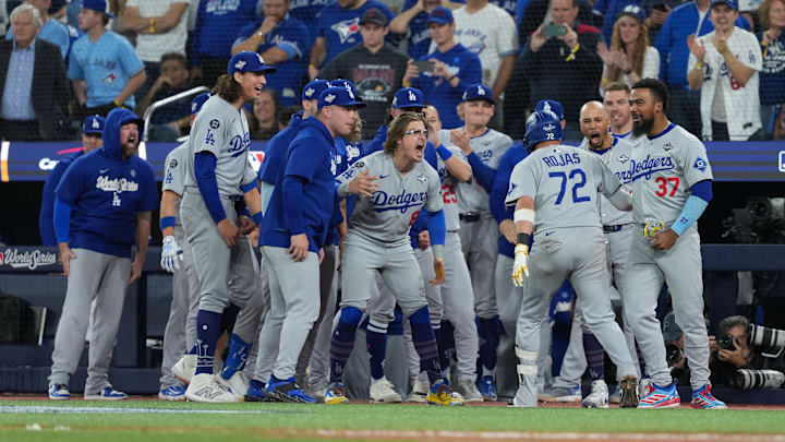 Nov 1, 2025; Toronto, Ontario, CAN; Los Angeles Dodgers second baseman Miguel Rojas (72) reacts after hitting a home run against the Toronto Blue Jays in the ninth inning for game seven of the 2025 MLB World Series at Rogers Centre. Mandatory Credit: Nick Turchiaro-Imagn Images