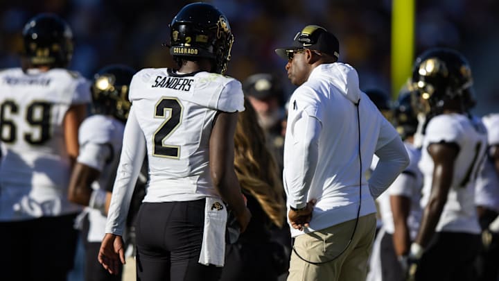 Oct 7, 2023; Tempe, Arizona, USA; Colorado Buffaloes head coach Deion Sanders with son and