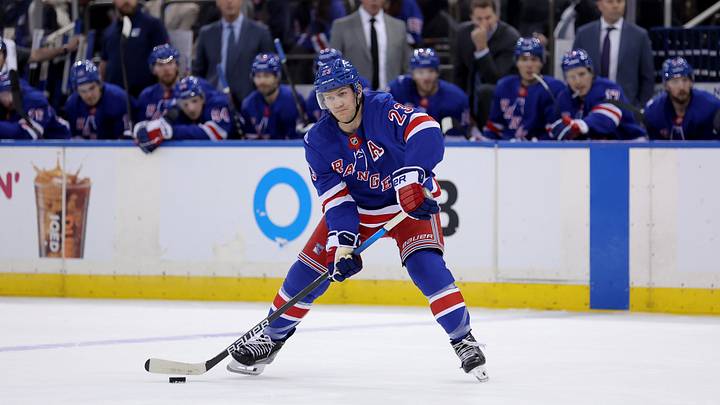 Oct 19, 2026; New York, New York, USA; New York Rangers defenseman Adam Fox (23) looks to pass the puck against the Anaheim Ducks during the second period at Madison Square Garden. Mandatory Credit: Brad Penner-Imagn Images