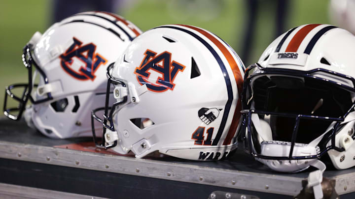 Oct 2, 2021; Baton Rouge, Louisiana, USA; Auburn Tigers helmets sits on a crate during a game against LSU Tigers at Tiger Stadium. Mandatory Credit: Stephen Lew-Imagn Images