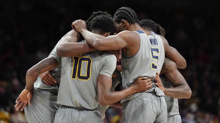 Jan 12, 2025; Boulder, Colorado, USA; Members of the West Virginia Mountaineers huddle in the first half against the Colorado Buffaloes at CU Events Center. Jan 12, 2025; Boulder, Colorado, USA; Members of the West Virginia Mountaineers huddle in the first half against the Colorado Buffaloes at CU Events Center.