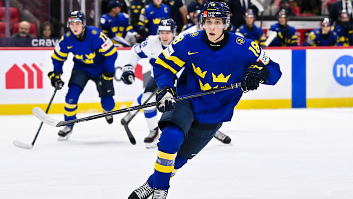 Victor Eklund (18) skates for Sweden as they take on Finland in the Semifinals at the 2025 IIHF World Junior Championship.