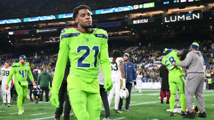 Dec 15, 2024; Seattle, Washington, USA; Seattle Seahawks cornerback Devon Witherspoon (21) walks off the field after the game against the Green Bay Packers at Lumen Field. Mandatory Credit: Steven Bisig-Imagn Images