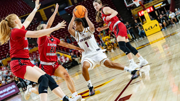 The Eastern Washington Eagles attempt to block Arizona State Sun Devils Amaya Williams (1) as she attempts to pass the ball during a game at Desert Financial Arena in Tempe, on Nov. 8, 2025.