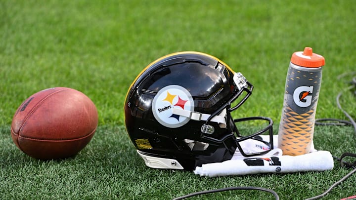 Aug 16, 2025; Pittsburgh, Pennsylvania, USA; A Pittsburgh Steelers helmet sits on the turf against the Tampa Bay Buccaneers during the first quarter at Acrisure Stadium. Mandatory Credit: Barry Reeger-Imagn Images