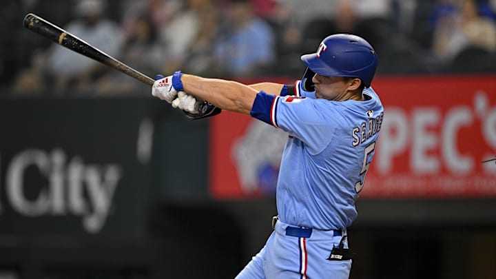 Apr 20, 2025; Arlington, Texas, USA; Texas Rangers shortstop Corey Seager (5) bats during the game between the Texas Rangers and the Los Angeles Dodgers at Globe Life Field. 