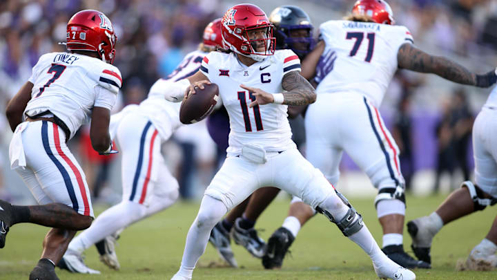 Nov 23, 2024; Fort Worth, Texas, USA; Arizona Wildcats quarterback Noah Fifita (11) throws a pass against the TCU Horned Frogs in the second half at Amon G. Carter Stadium. Mandatory Credit: Tim Heitman-Imagn Images Nov 23, 2024; Fort Worth, Texas, USA; Arizona Wildcats quarterback Noah Fifita (11) throws a pass against the TCU Horned Frogs in the second half at Amon G. Carter Stadium. Mandatory Credit: Tim Heitman-Imagn Images
