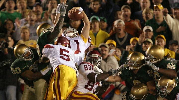 Oct. 15, 2005; South Bend, IN, USA; Southern California Trojans quarterback Matt Leinart runs the ball into the endzone for the game-winning score against the Notre Dame Fighting Irish Saturday Oct. 15 at Notre Dame Stadium. USC won 34-31. Oct. 15, 2005; South Bend, IN, USA; Southern California Trojans quarterback Matt Leinart runs the ball into the endzone for the game-winning score against the Notre Dame Fighting Irish Saturday Oct. 15 at Notre Dame Stadium. USC won 34-31.