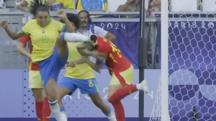 Marta ends up in an unfortunate position during Brazil’s World Cup match against Spain.