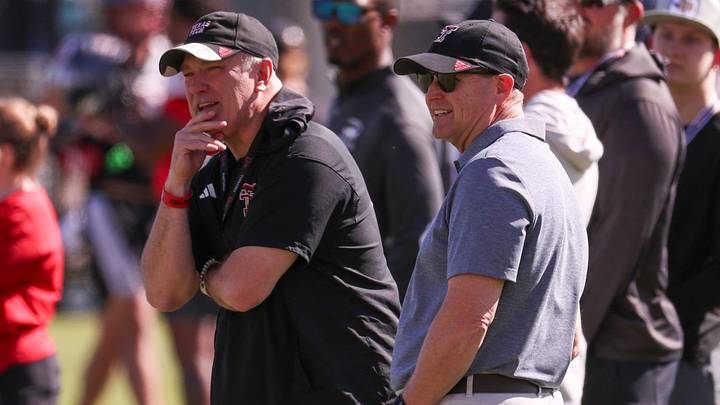 Texas Tech director of athletics Kirby Hocutt and head coach Joey McGuire look on during spring football practice, Thursday, April 2, 2026, at the Womble Football Center.