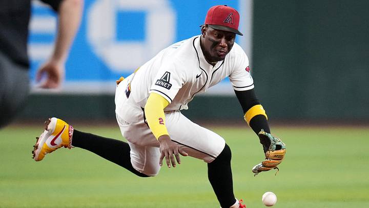 Arizona Diamondbacks infielder Geraldo Perdomo (2) snags a ground ball against the Los Angeles Dodgers at Chase Field in Phoenix on June 1, 2026. Arizona Diamondbacks infielder Geraldo Perdomo (2) snags a ground ball against the Los Angeles Dodgers at Chase Field in Phoenix on June 1, 2026.