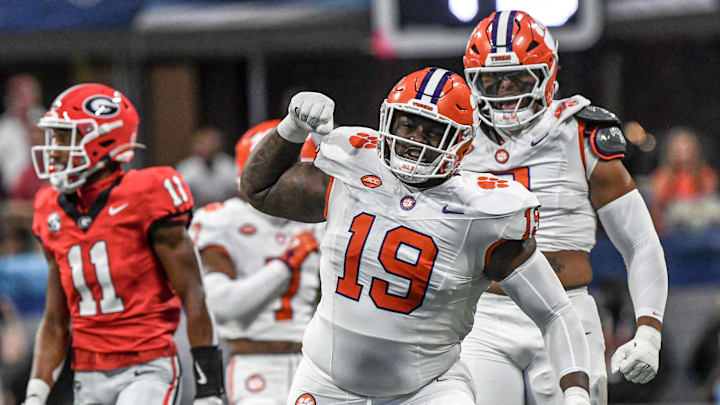 Aug 31, 2024; Atlanta, Georgia, USA; Clemson Tigers defensive lineman DeMonte Capehart (19) reacts after tackling Georgia Bulldogs running back Branson Robinson (not pictured) during the first quarter of the 2024 Aflac Kickoff Game at Mercedes-Benz Stadium. 