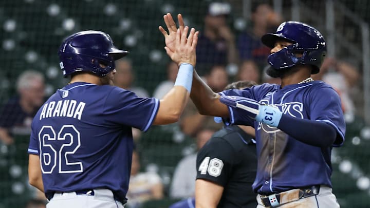 Tampa Bay first baseman Jonathan Aranda (left) celebrates with third baseman Junior Caminero in the 13-3 win over Houston. 