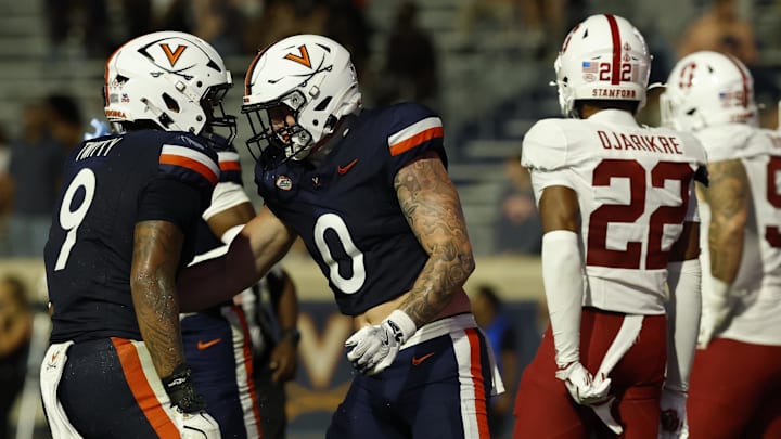 Sep 20, 2025; Charlottesville, Virginia, USA; Virginia Cavaliers tight end Sage Ennis (0) celebrates with Cavaliers tight end Dakota Twitty (9) after catching a touchdown pass against the Stanford Cardinal during the third quarter at Scott Stadium. Mandatory Credit: Geoff Burke-Imagn Images Sep 20, 2025; Charlottesville, Virginia, USA; Virginia Cavaliers tight end Sage Ennis (0) celebrates with Cavaliers tight end Dakota Twitty (9) after catching a touchdown pass against the Stanford Cardinal during the third quarter at Scott Stadium. Mandatory Credit: Geoff Burke-Imagn Images