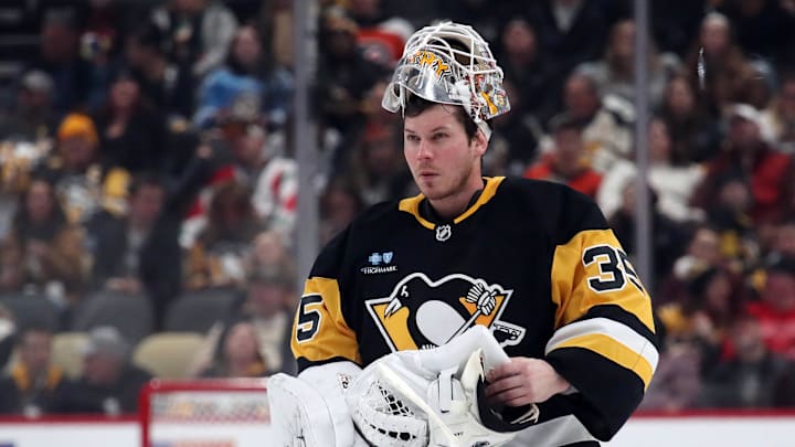 Dec 23, 2024; Pittsburgh, Pennsylvania, USA;  Pittsburgh Penguins goaltender Tristan Jarry (35) returns to his net against the Philadelphia Flyers during the second period at PPG Paints Arena. Mandatory Credit: Charles LeClaire-Imagn Images
