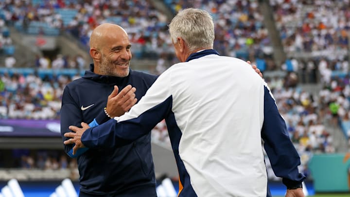 Maresca smiling with Ancelotti on the touchline during Chelsea's 2024 pre-season tour of the United States.