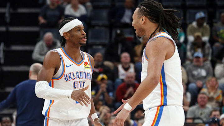 Mar 5, 2025; Memphis, Tennessee, USA; Oklahoma City Thunder guard Shai Gilgeous-Alexander (2) reacts with forward Jaylin Williams (6) during the fourth quarter against the Memphis Grizzlies at FedExForum. Mandatory Credit: Petre Thomas-Imagn Images
