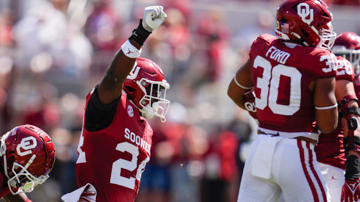 Oklahoma Sooners linebacker Samuel Omosigho (24) celebrates after a tackle during a college football game between the University of Oklahoma Sooners and the Tulane Green Wave at Gaylord Family - Oklahoma Memorial Stadium.