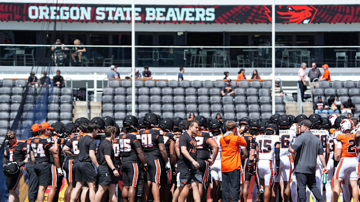The Oregon State football team huddles before the Oregon State Spring Game at Reser Stadium on Saturday, April 25, 2026, in Corvallis, Ore.