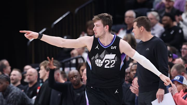 Mar 27, 2025; Salt Lake City, Utah, USA; Utah Jazz forward Kyle Filipowski (22) reacts after making a three-point shot against the Houston Rockets during the second half at Delta Center. Mandatory Credit: Rob Gray-Imagn Images