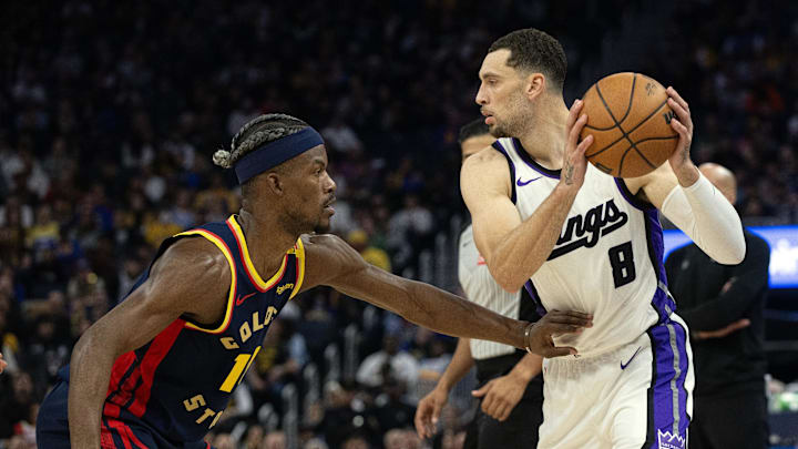 Mar 13, 2025; San Francisco, California, USA; Sacramento Kings guard Zach LaVine (8) looks to pass around Golden State Warriors forward Jimmy Butler III (10) during the second quarter at Chase Center. Mandatory Credit: D. Ross Cameron-Imagn Images
