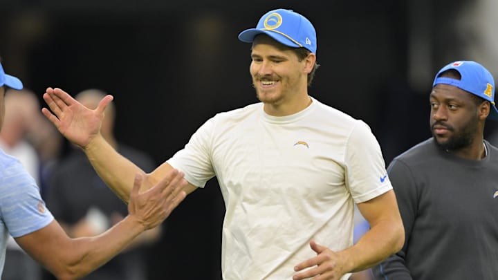 Dec 19, 2024; Inglewood, California, USA;  Los Angeles Chargers quarterback Justin Herbert (10) warms up prior to the game against the Denver Broncos at SoFi Stadium. Mandatory Credit: Jayne Kamin-Oncea-Imagn Images