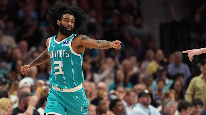Charlotte Hornets guard Coby White (3) acknowledges an assist 