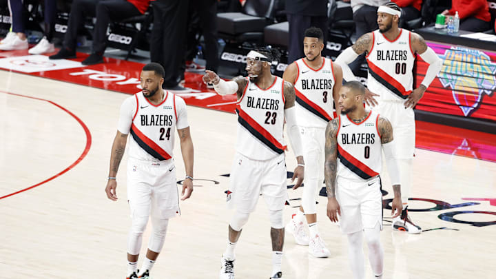 May 27, 2021; Portland, Oregon, USA; Portland Trail Blazers (from left to right) Norman Powell (24), Robert Covington (23), Damian Lillard (0), CJ McCollum (3) and Carmelo Anthony (00) walk back to the court after a timeout during the second half of game three in the first round of the 2021 NBA Playoffs against the Denver Nuggets at Moda Center. Mandatory Credit: Soobum Im-Imagn Images May 27, 2021; Portland, Oregon, USA; Portland Trail Blazers (from left to right) Norman Powell (24), Robert Covington (23), Damian Lillard (0), CJ McCollum (3) and Carmelo Anthony (00) walk back to the court after a timeout during the second half of game three in the first round of the 2021 NBA Playoffs against the Denver Nuggets at Moda Center. Mandatory Credit: Soobum Im-Imagn Images