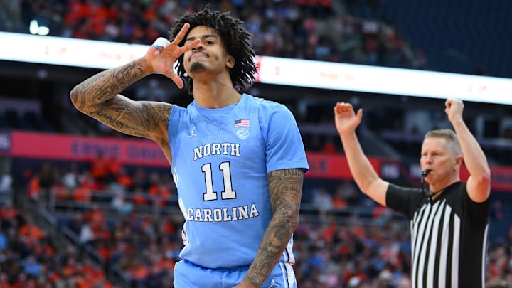 Feb 21, 2026; Syracuse, New York, USA; North Carolina Tar Heels forward Jonathan Powell (11) reacts to his three-point basket during the first half against the Syracuse Orange at the JMA Wireless Dome. Mandatory Credit: Rich Barnes-Imagn Images