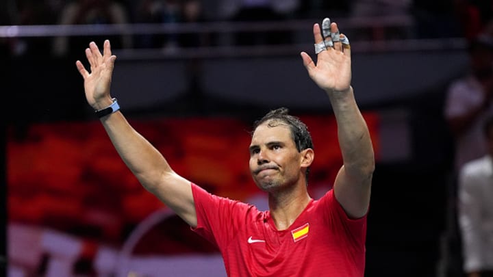 Rafael Nadal of Team Spain waves to the crowd after his loss at the Davis Cup.