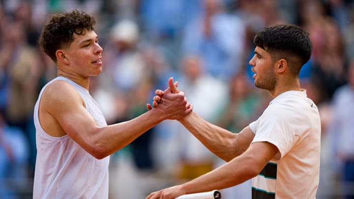 Ben Shelton and Carlos Alcaraz shake hands after a French Open match.