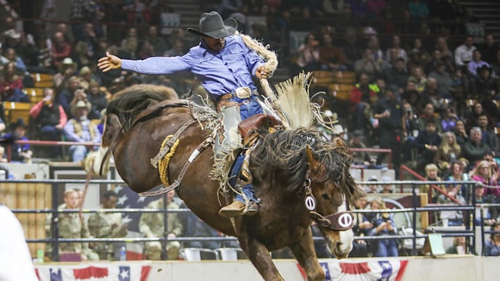 Saddle bronc riding action at NWSS