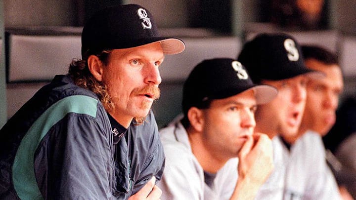 Seattle Mariners pitcher Randy Johnson (L) looks o