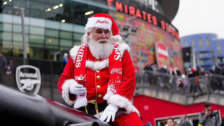 Fans in England love soccer at Christmas. Fans in England love soccer at Christmas.