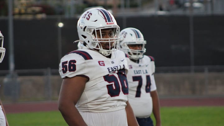 Garfield High linemen get prepared for a game against San Pedro.