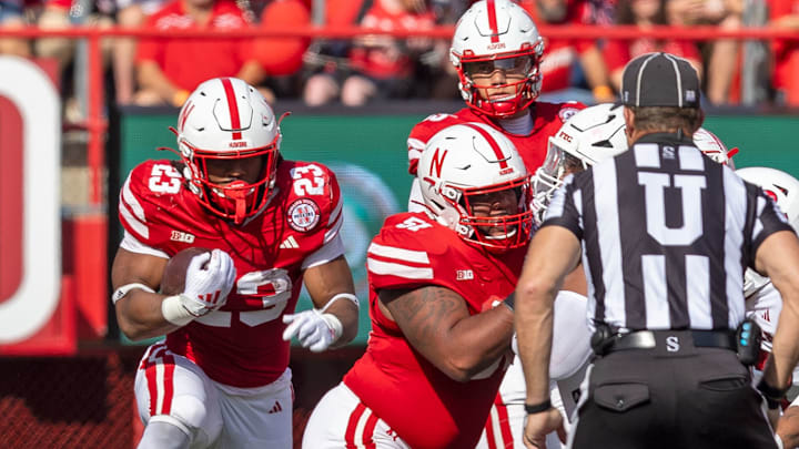 Nebraska running back Dante Dowdell rushes for an 11-yard gain against Rutgers.